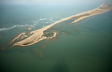 Dhanushkodi island among blue waters of Bay of Bengal.