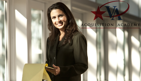 Businesswoman looking at file in hallway