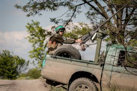 epa10637150 Ukraine servicemen of an anti-aircraft unit of the '24 separate mechanized brigade named after King Danylo' drive to take up position at an undisclosed location, in Donetsk region, Ukraine, 18 May 2023. Russian troops entered Ukraine on 24 February 2022 starting a conflict that has provoked destruction and a humanitarian crisis. EPA-EFE/OLEG PETRASYUK