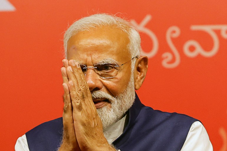 Indian Prime Minister Narendra Modi gestures, at the Bharatiya Janata Party (BJP) headquarters in New Delhi