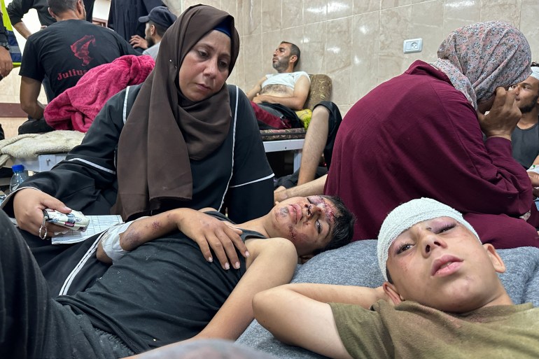 SENSITIVE MATERIAL. THIS IMAGE MAY OFFEND OR DISTURB Wounded Palestinians injured in an Israeli strike on a UNRWA school shelter look on at Al-Aqsa Martyrs Hospital, amid the Israel-Hamas conflict, in Deir Al-Balah, in central Gaza Strip, June 6, 2024. REUTERS/Doaa Rouqa
