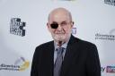Sir Salman Rushdie has said his injuries have made writing harder (PA/Jordan Pettitt)