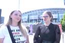 Taylor Swift fans Lauren Robinson, 20, and Grace Arnold, 24, are among those arriving early at Wembley (Saghar Kouhesatani/PA)