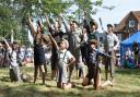 Young performers entertain a large crowd at the hospital fete