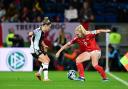 Ceri Holland in action for Wales against Germany.