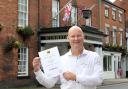 Chris Birdsell-Jones with the AA Gold five-star award for the Wynnstay Hotel in Oswestry.