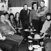 Whittington cricket club held a cabaret evening at their new club house Seen here with guests are committee members Steve Bellington, Dave Jones and Brian Whitley (standing) 1992