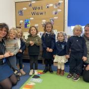 Pre-school Leader Libby Williams (left) and Pre-school Assistant Pollie Owen (Right) with pupils from Owlets.