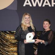 Maddie Hughes (left) picks up her Young Business Person award on Friday.