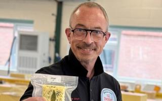 Matthew Lloyd, with some of his award winning cheese.