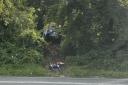 The car on the grass bank on the A37