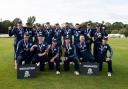 Brad Currie (back row, third from right) celebrates with his Scotland teammates after securing their spot at next year's T20 World Cup