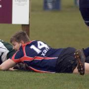 Bournemouth wing Ethan Goudie touches down for the Twin Counties (Picture: Idris Martin)