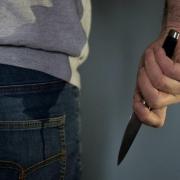 Stock photo of man with knife.