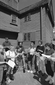 Boston city archaeologist Ellen Berkland (GRS'89) and Mary Beaudry, a CAS associate archaeology professor (both at right), prepare the class for a tour of the Paul Revere House in the North End. The house was built in 1680; Revere owned it from 1770 to 1800. Photo by Kalman Zabarsky