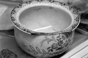 A colonial-era chamber pot at the Boston City Archaeology Laboratory on Cross Street in the North End. Photo by Kalman Zabarsky