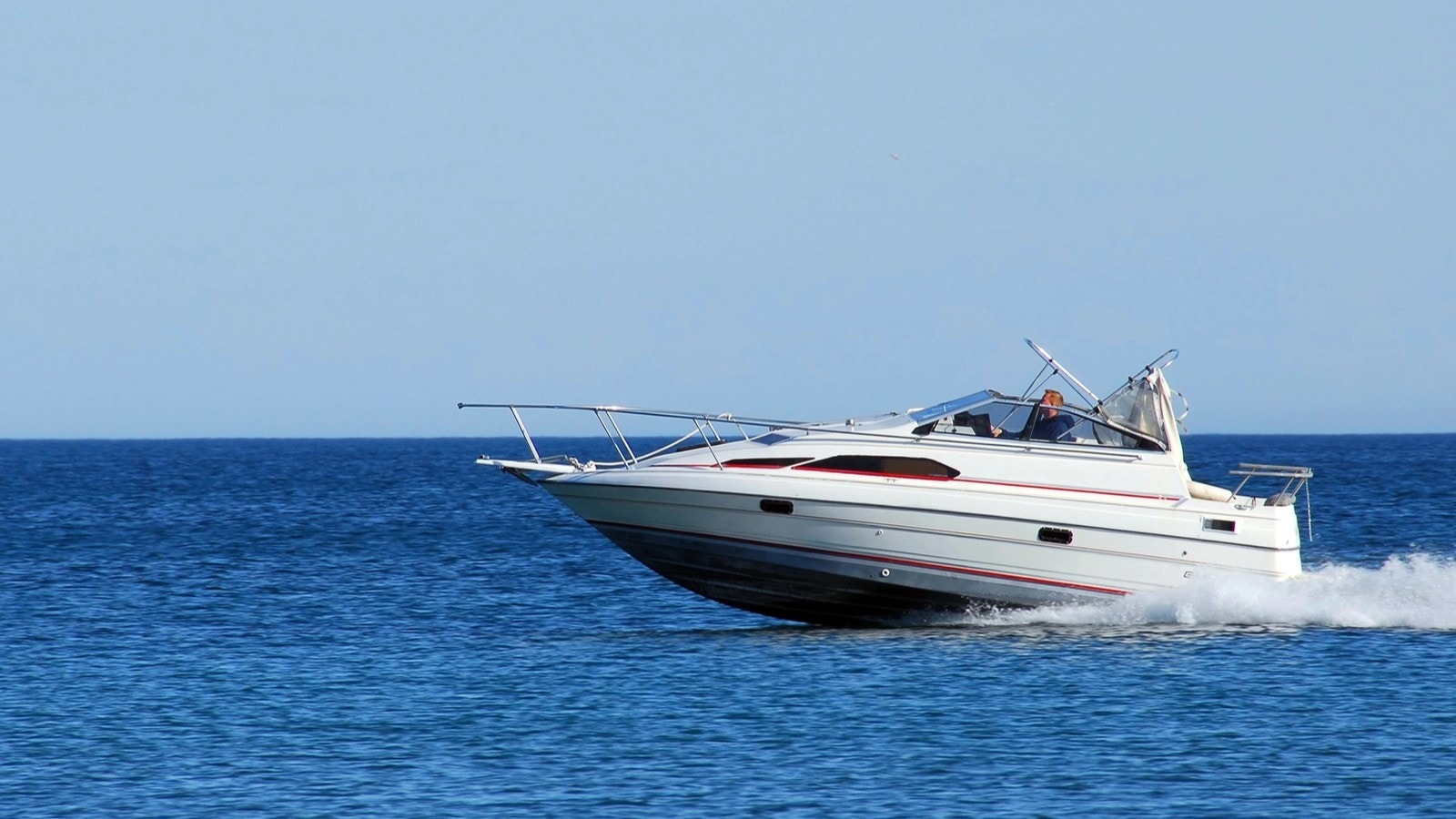 Boat gliding across water