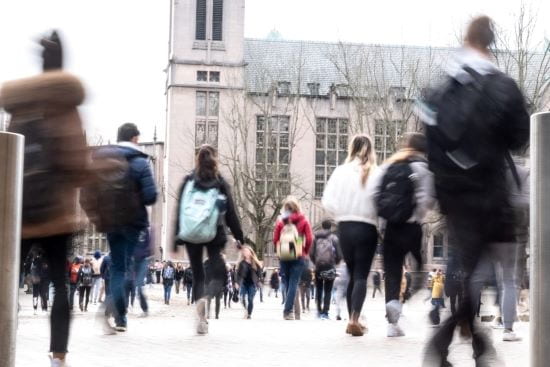 People walking across Red Square on UW's Seattle campus