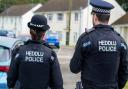 Dyfed-Powys Police have charged the men following disorder in Borth on Tuesday.