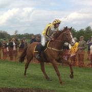 Steve and Alexander cross the finishing line at Skipton Races in 2017