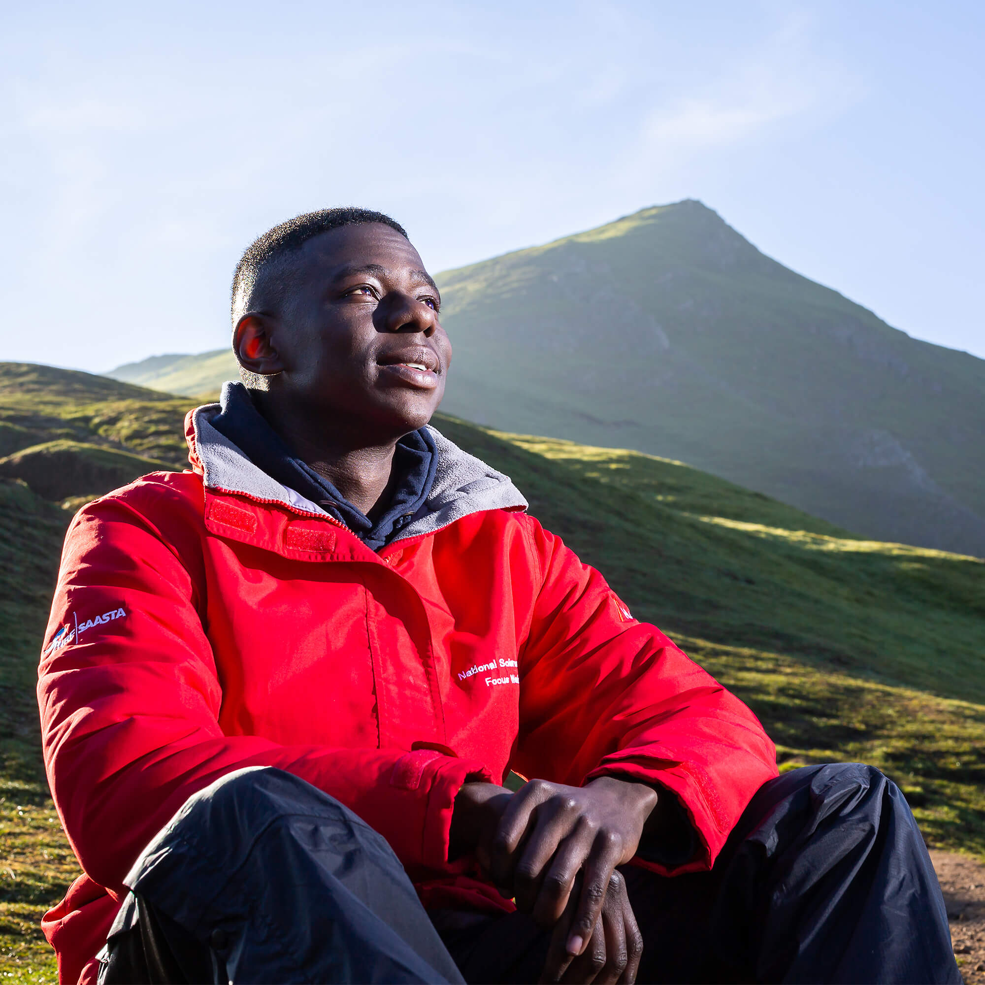 Sam sitting on Thorpe Cloud in Dovedale