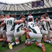 Dorset & Wilts Under-20s console themselves after the final whistle