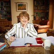 Pam Ayres MBE at desk