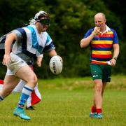 Some of the teams at Puddlefest wore costumes to the touch rugby competition