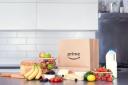 The retail technology giant said customers in more than 100 towns and cities would now be able to get same-day delivery without needing to be Prime members (Amazon/PA)