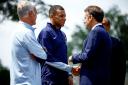 Kylian Mbappe shakes hands with French President Emmanuel Macron (Sarah Meyssonnier/Pool Photo via AP)