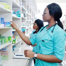 Woman adjusting medicine package