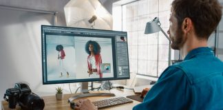 Editor uses computer desktop in editing photo