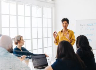 Female leader having a meeting with colleagues