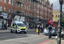 Police at Stoke Newington High Street after a shooting