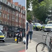 Police have closed Stoke Newington High Street after a man was shot