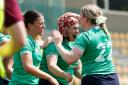 Ireland's Kelly Burke celebrates scoring a try with Jade Gaffney and Kate Flannery during the Six Nations Women's Summer Series between Ireland and Italy