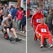 Revellers take part in a wheelbarrow race in Pinner for St George' Day