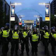 Police outside the UEFA Champions League final at Wembley Stadium on Saturday (June 1)