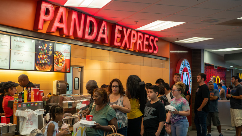 people linked up ordering at Panda Express