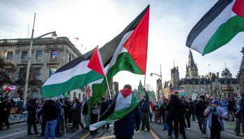 People march to the Byward Market after a pro-Palestine rally organized by the Palestinian Youth Movement  on Parliament Hill on  Nov. 25, 2023.