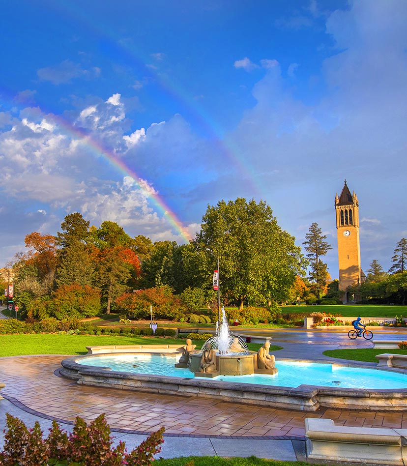 View of the fountain and campanile with a double rainbow backdrop