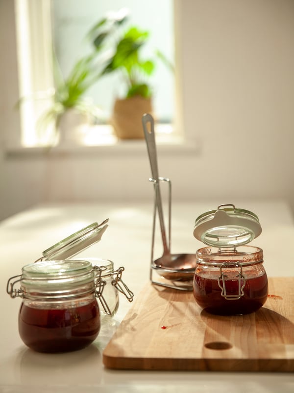 KORKEN jars filled with fruit preserve.