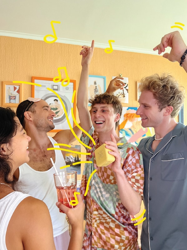 A group of friends dancing in their pajamas.