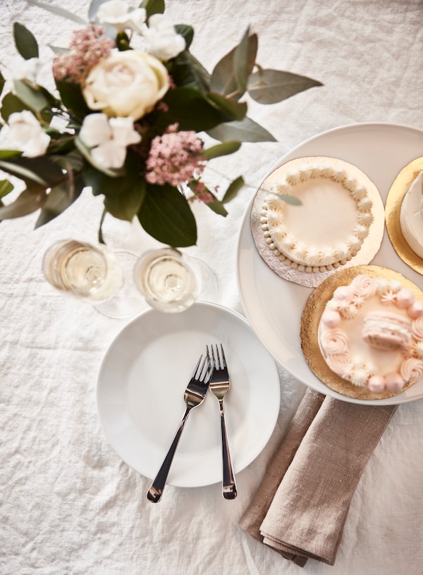 A table setting with florals and pastries