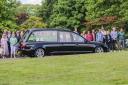 LOVED: The hearse bears the coffin of 20-year-old Worcestershire County Cricketer Josh Baker