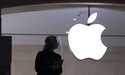 An Apple store employee stands inside the store in New York on February 5, 2021