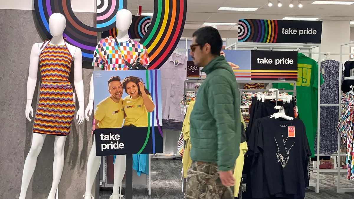 A customer walks by a Pride Month merchandise display at a Target store on May 31, 2023 in San Francisco,