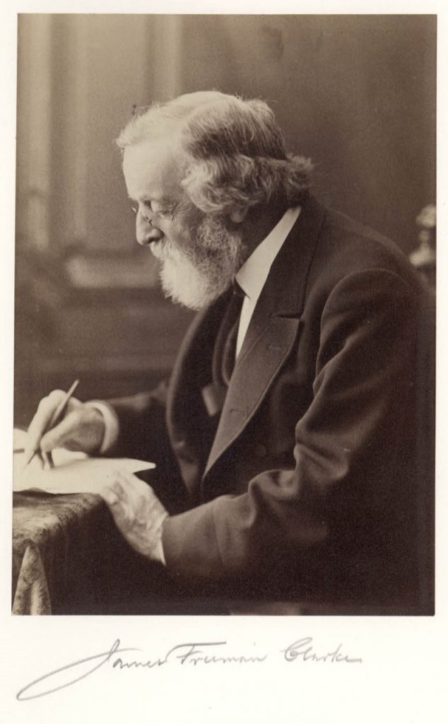 Black-and-white photograph of a white man with gray hair, beard, and glasses seated at a desk writing. Below the photograph is the signature “James Freeman Clarke.” 