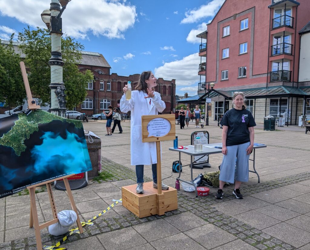 Katherine Helliwell and Susie Wharam presenting at Soapbox Science in Exeter Quayside