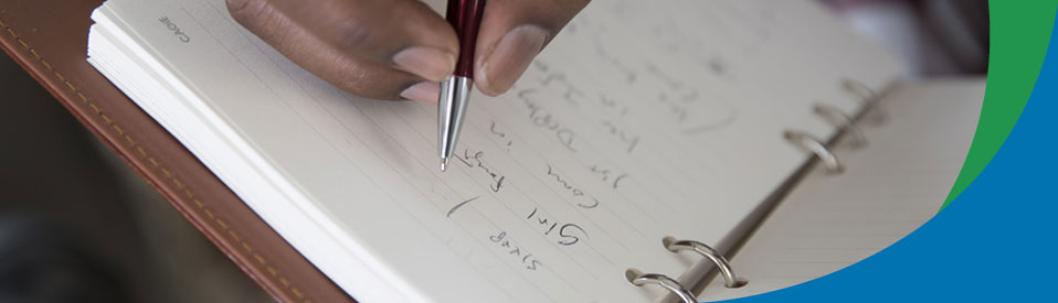 woman writing in journal